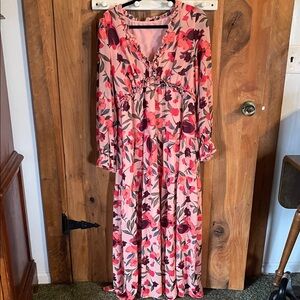 Long dress. No name brand tag. Lined. Polyester.